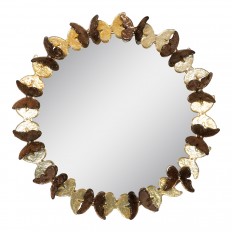 Circular brass mirror with butterfly surround